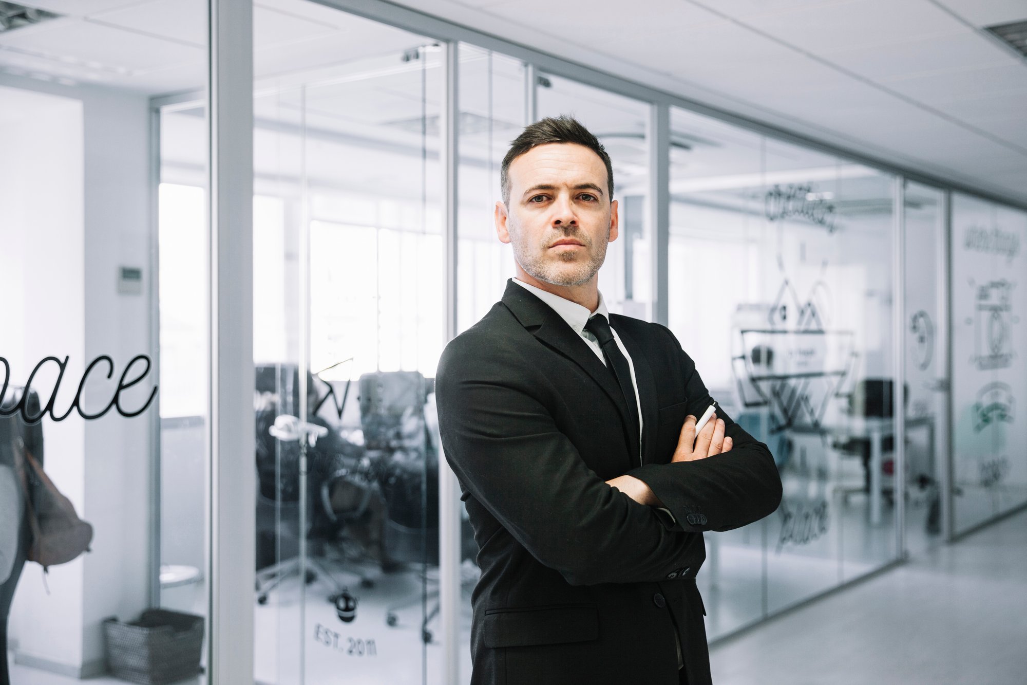executive-with-arms-crossed